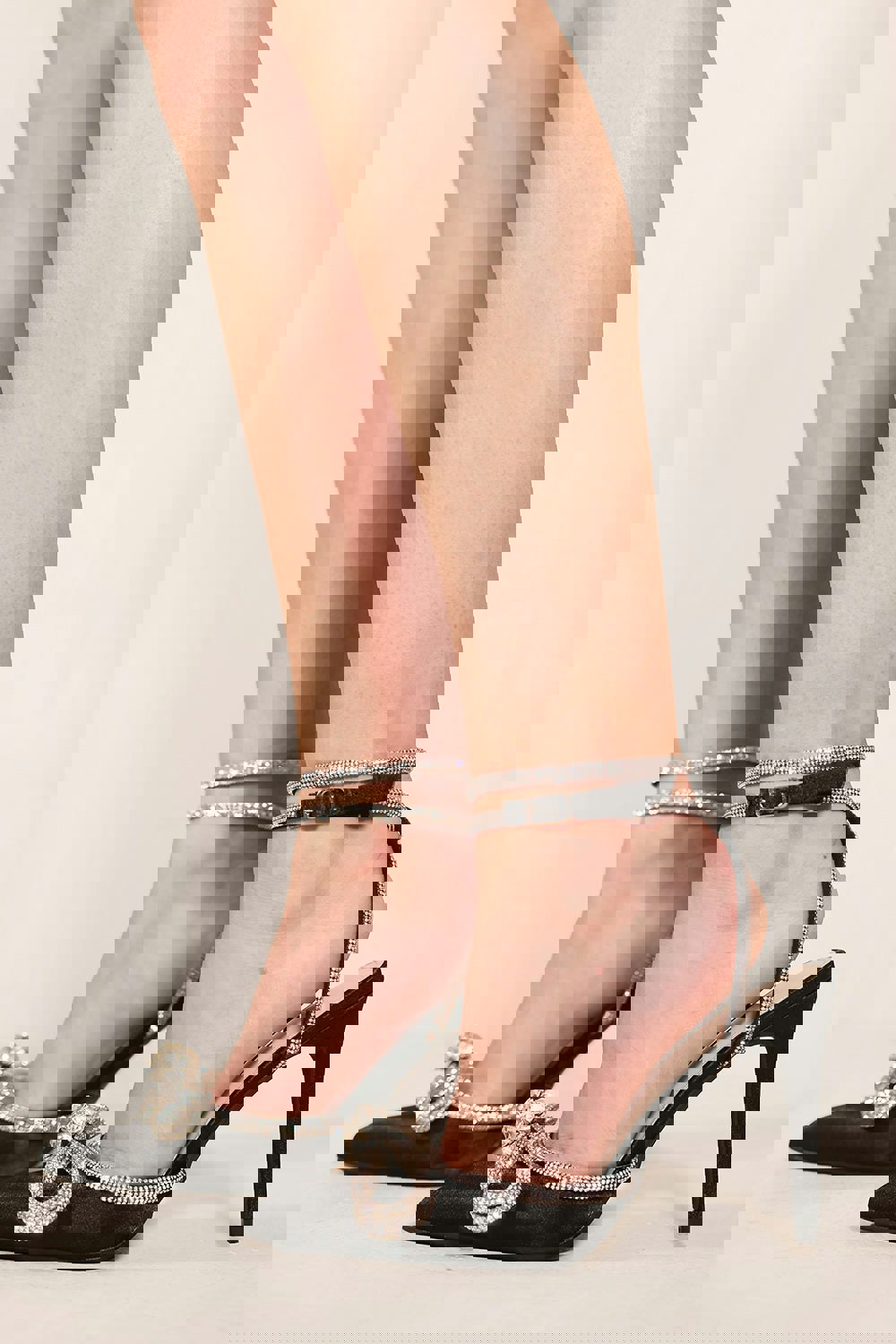 Where's That From Fanen Pointed Toe High Heels With Diamante Bow & Ankle Strap in Black Silk