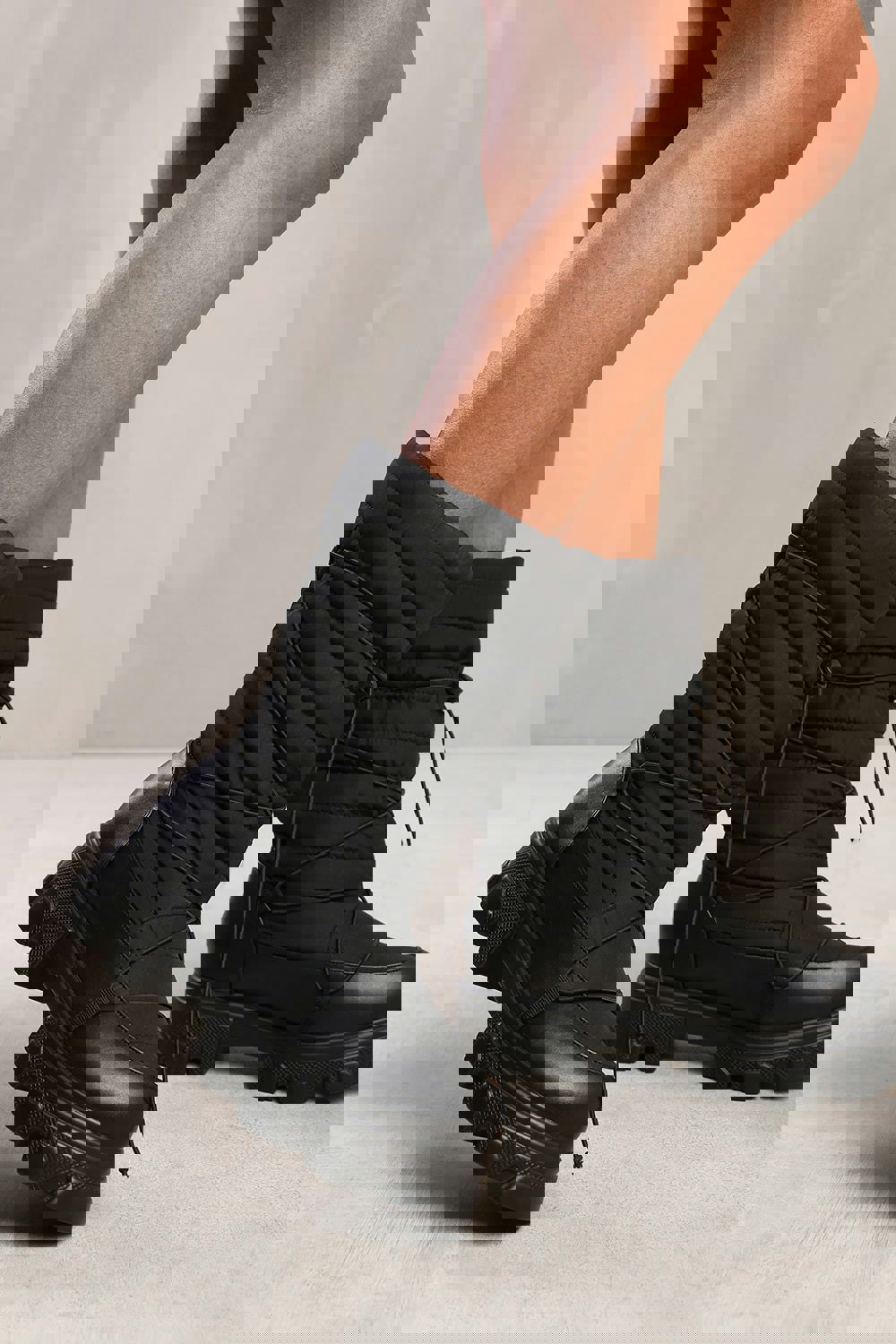 Where's That From Rosie Puffer Quilted Boot With Chunky Soles in Black