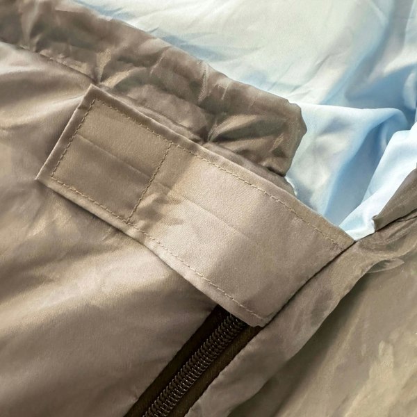 A closeup image of the velcro strap of the OLPRO X Stafford Sleeping Bag