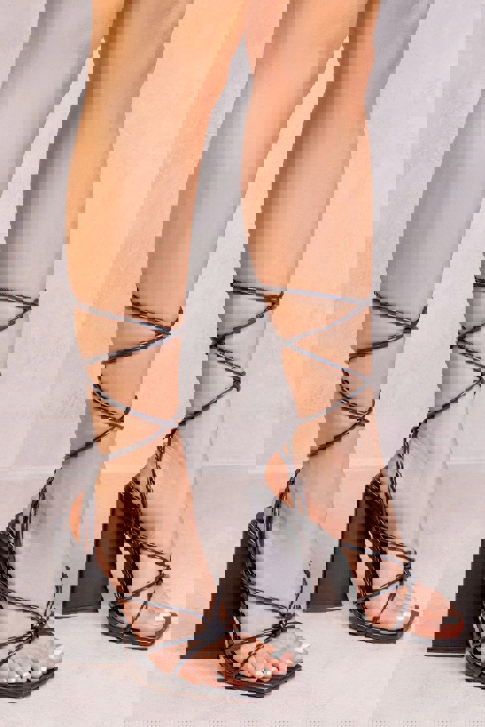 Where's That From Pyramid Block Heel Knot Detail Lace Up in Black Faux Leather