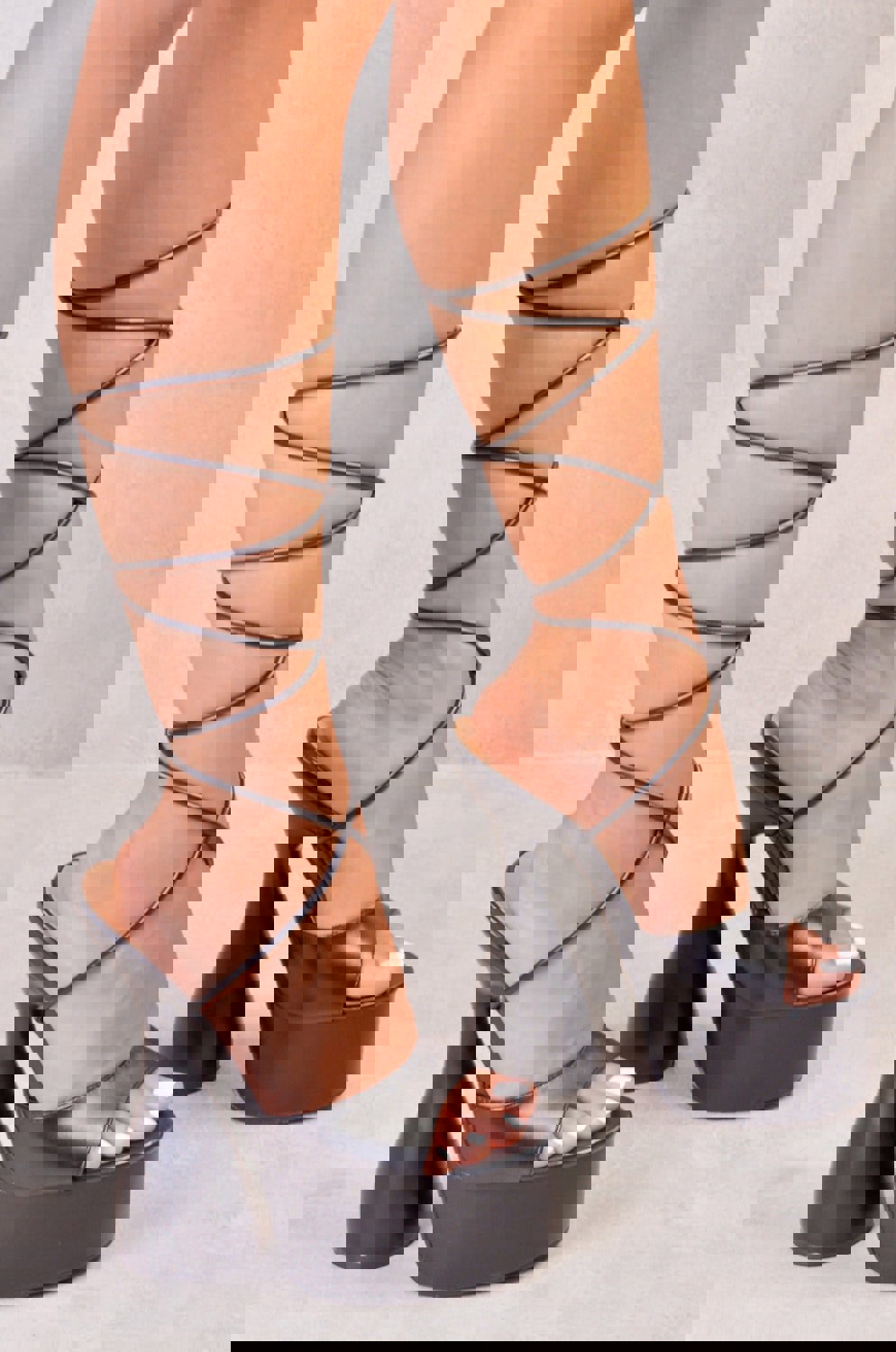 Where's That From Flared High Heels With a Leg Tie in Black Faux Leather