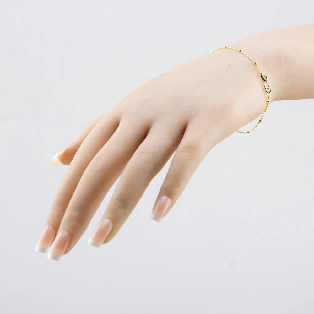 T. H. Baker 9ct Yellow Gold Curb Chain Ball Bracelet 1.23.7911