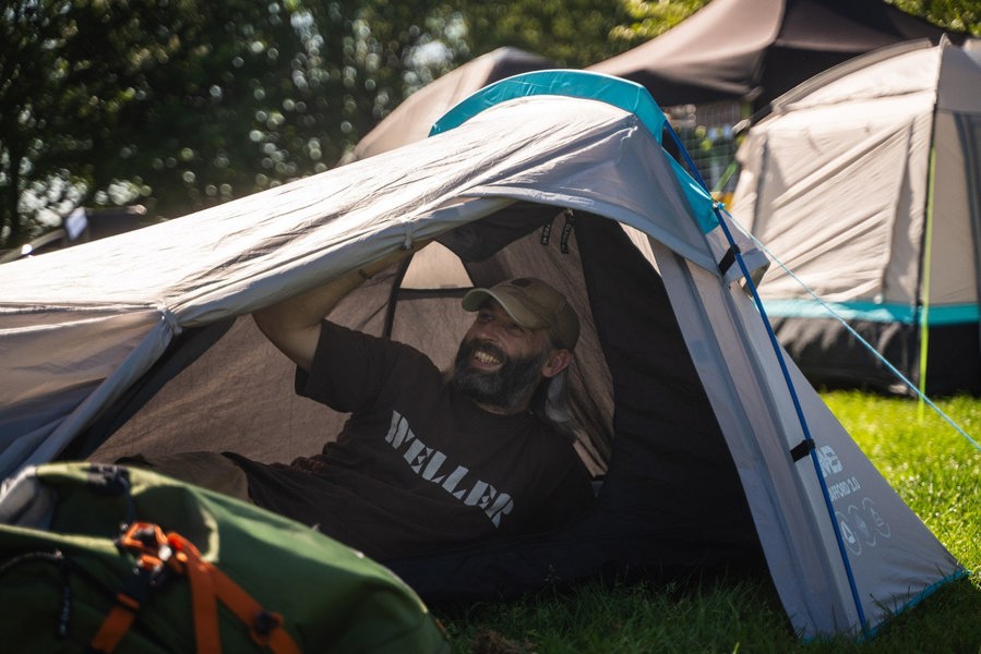 A man lies in side the Stafford 2.0 backpacking tent.