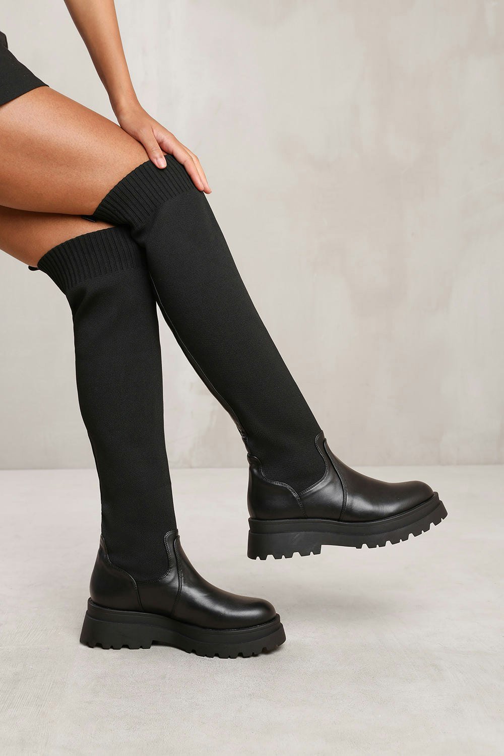 Where's That From Cleo Knee High Knitted Sock Boot in Black