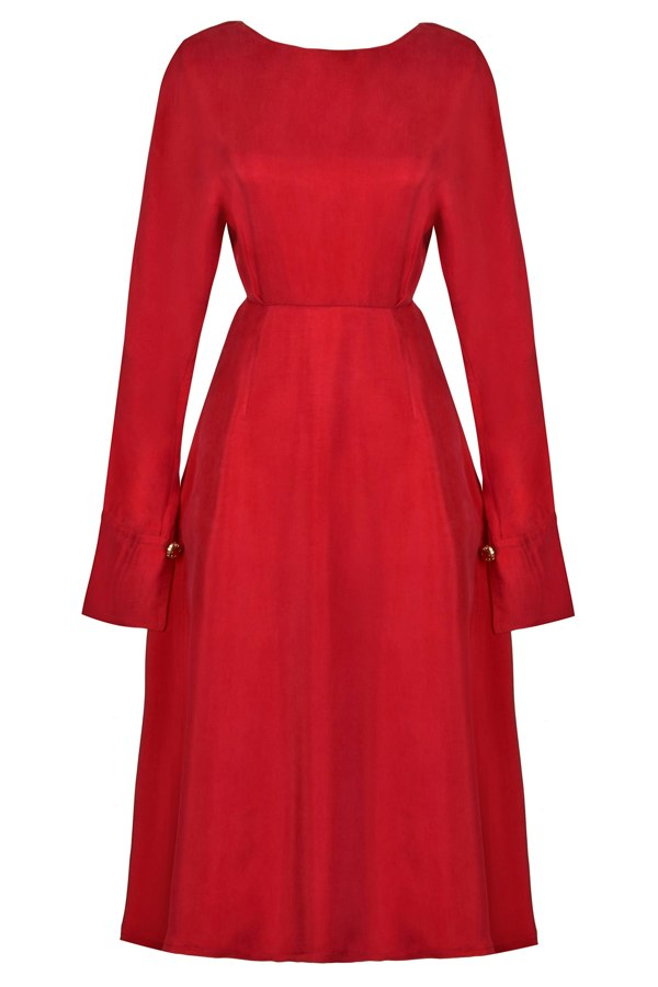 a Sarvin Long Sleeve Midi Dress with pockets.