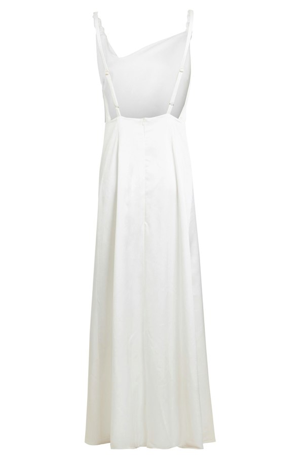 An Asymmetric White Maxi Dress by Sarvin with straps and buttons.