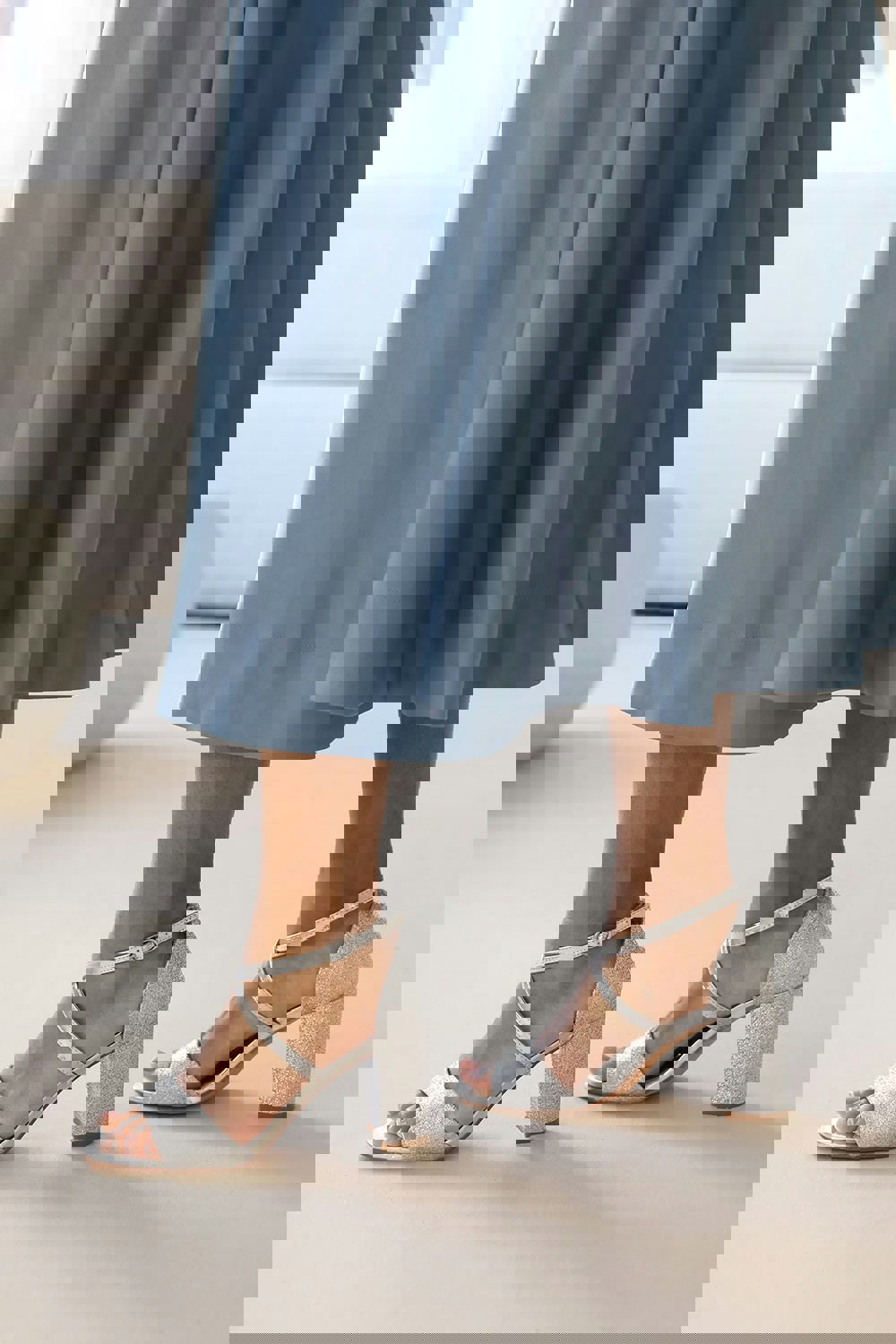 Where's That From Anomie Mid High Block Heel Sandals With Cross Over Ankle Strap in Silver