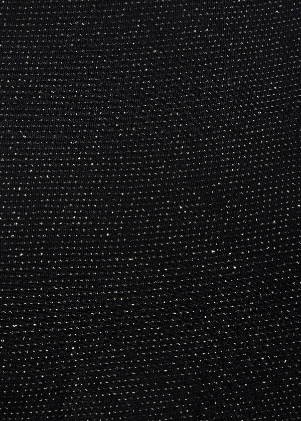 a close up of a Sarvin Black Cowl Back Gown with dots on it.