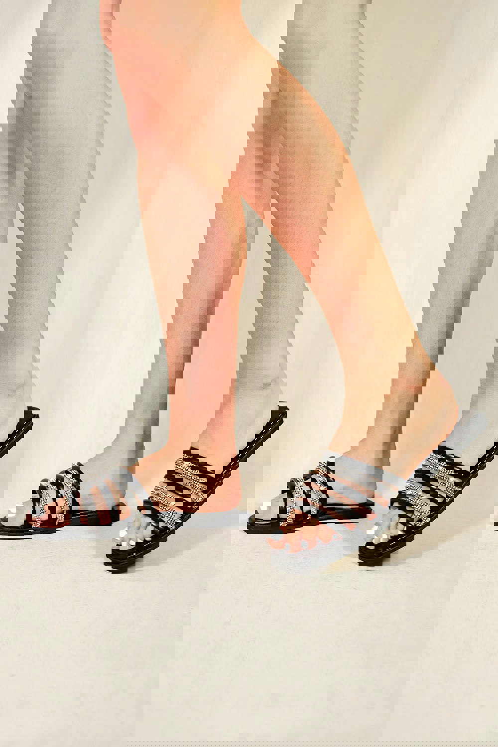 Where's That From DELILAH FLATFORM STRAPPY SLIDERS WITH DIAMANTE DETAIL IN BLACK FAUX LEATHER