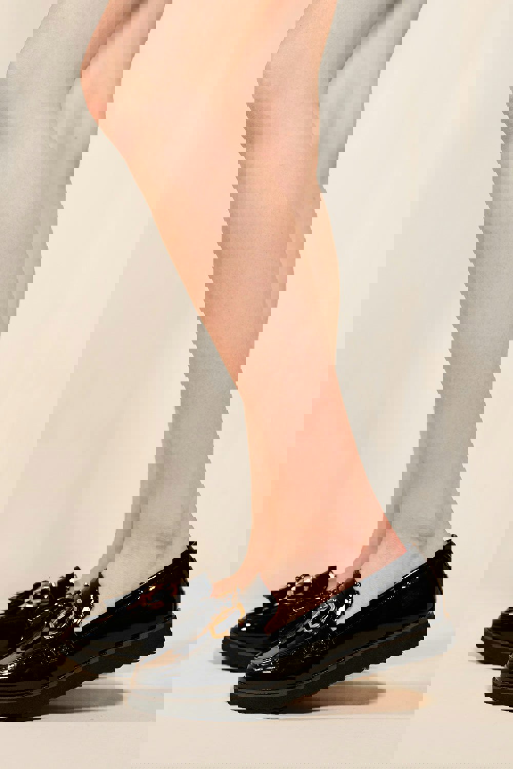 Where's That From Neda Flatfrom Loafers With Tassle and Metal Detail in Black Faux Patent