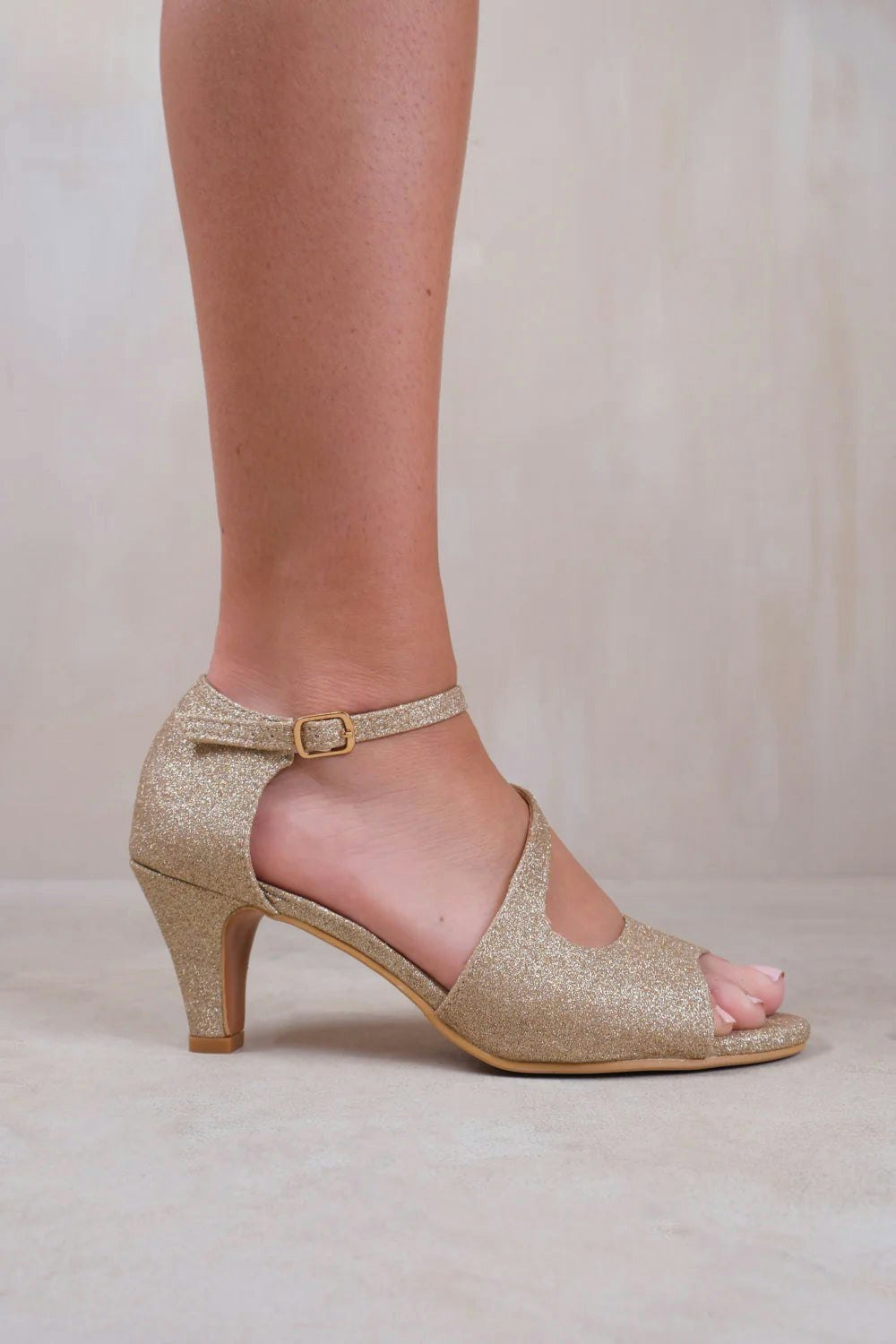 Where's That From Beatrice Extra Wide Fit Low Kitten Heel With Crossover Strap In Gold Glitter