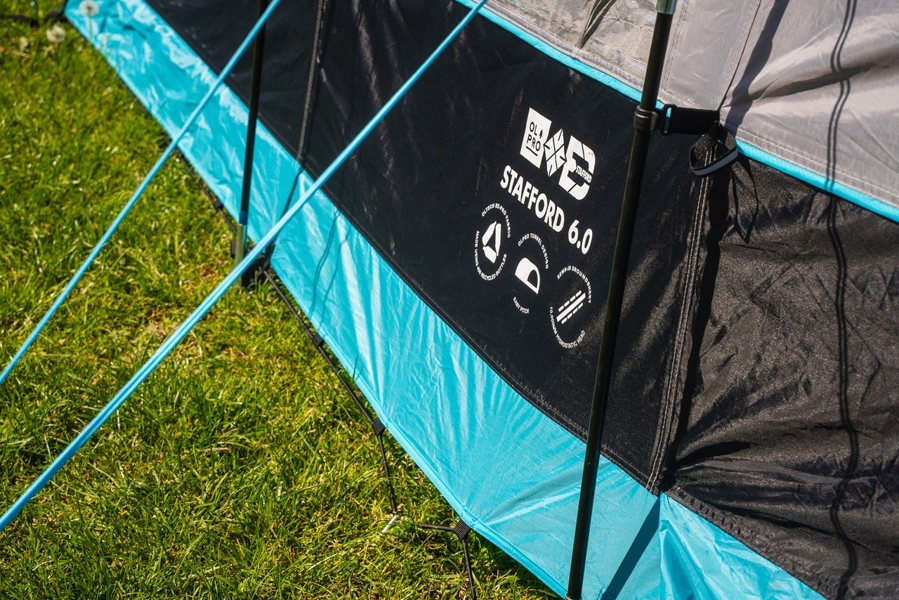 The 6 berth Stafford 6.0 Tent by OLPRO x Ed Stafford has a name badge on the side of the tent