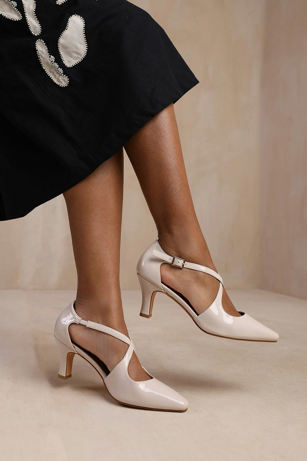Where's That From Colorado Wide Fit Cross Over Strap Mid Block Heel in Cream Patent