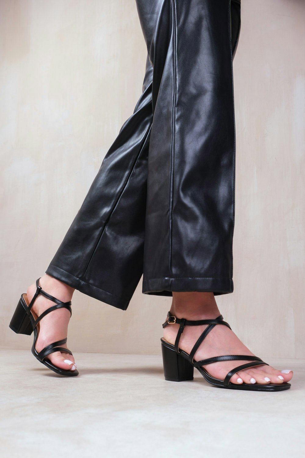 Where's That From Sidra Mid High Block Heel Sandals With Cross Over Strap in Black Faux Leather