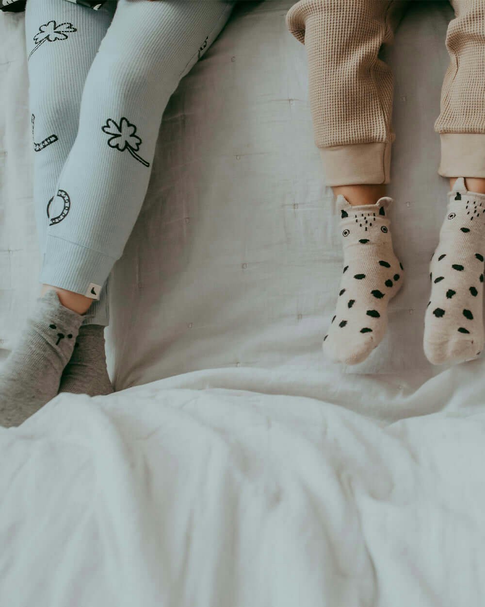 Kids wearing 3 pack unisex bear socks
