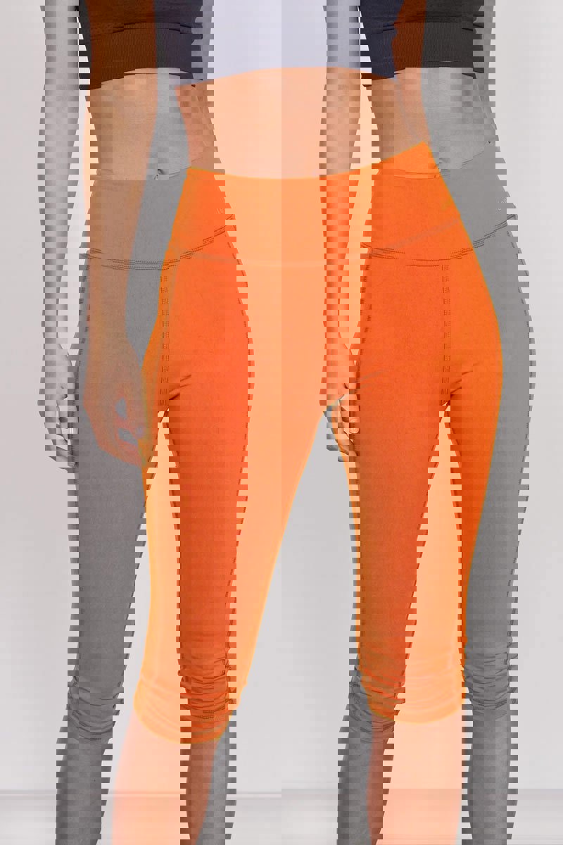 Jeetly.comTaylor Orange 3/4 Sports LeggingsActivewear