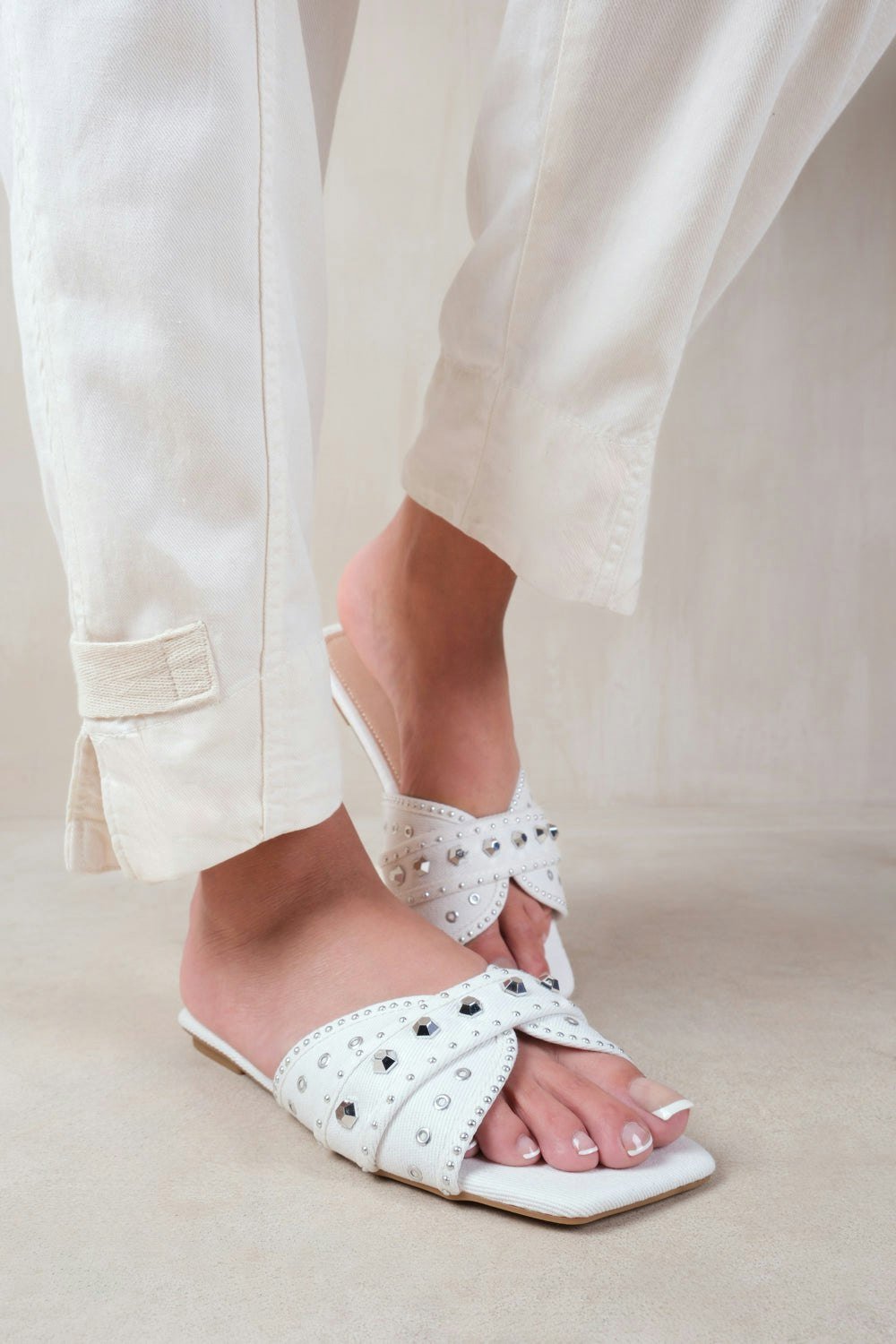 Where's That From Saturn Double Cross Over Strap Flat Sandals With Stud Details in White Faux Leather