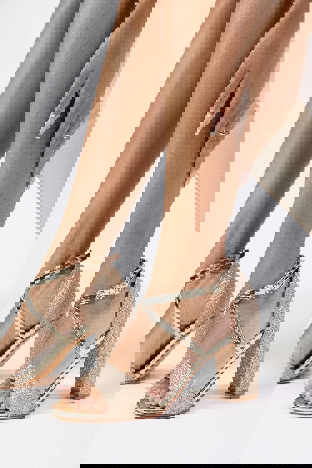 Where's That From Anomie Mid High Block Heel Sandals With Cross Over Ankle Strap in Gold