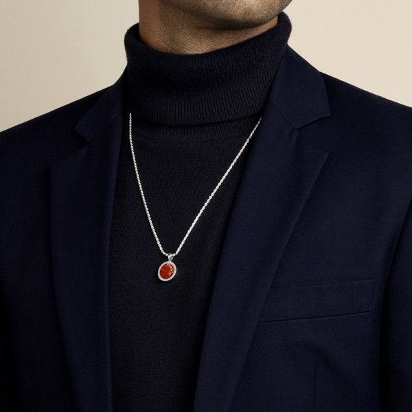 model wearing red jasper amulet pendant with 1.8mm diamond cut rope chain in sterling silver