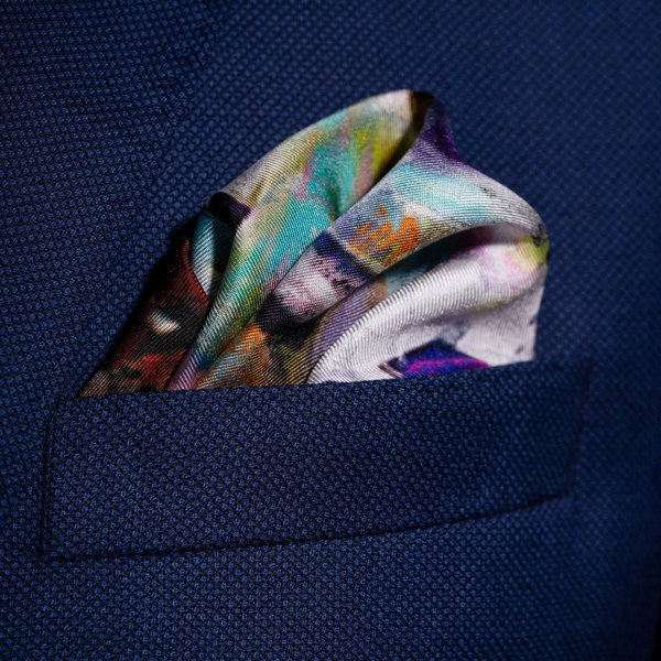 American football silk pocket square in red, white & purple by Otway & Orford folded in top pocket