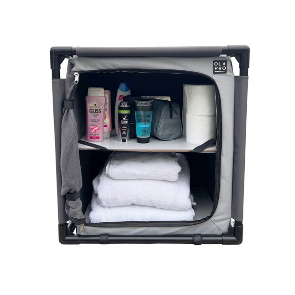 An image of the Camp Storage Cupboard from OLPRO being used as storage for toiletry and bathroom items.