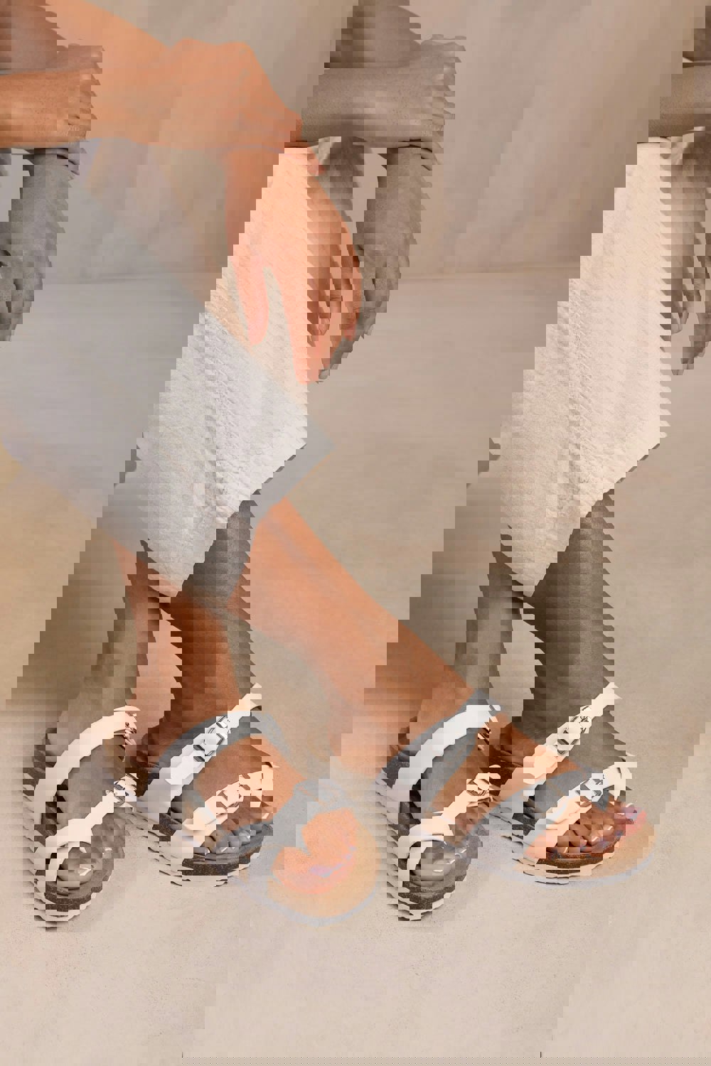 Where's That From Rio Two Strap Flat Sandals With Toe Loop and Buckle Detail in White Pu