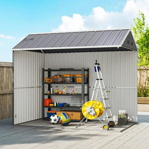 Grey metal garden shed with open double doors and storage for tools.
