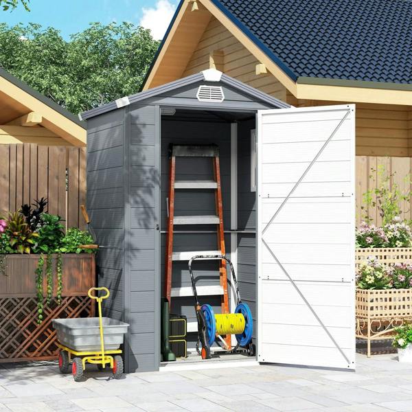 Grey wall shed with open doors and front storage area with tools