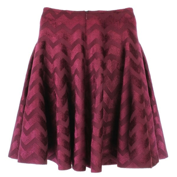 Alaia circular skater skirt in claret velvet with chevron patterning