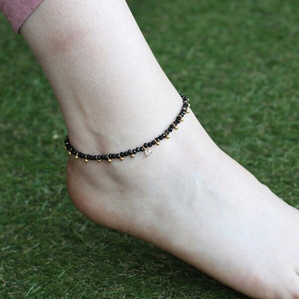 The Colourful Aura Black beaded gold dangle slim nazar payal anklet