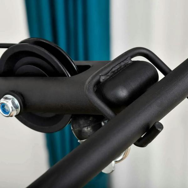 Close-up of black foam-padded arm handle with metal fasteners