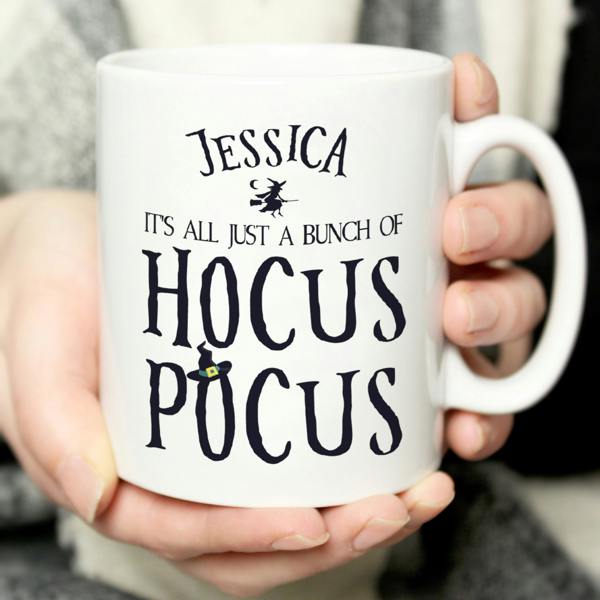 Hands holding a white personalised Halloween mug reading Jessica It's All Just A Bunch Of Hocus Pocus