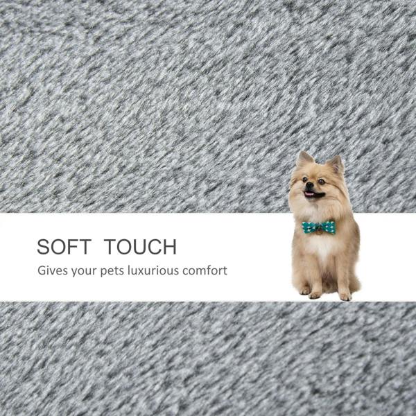 Grey plush pet stairs fabric texture on step and scratching post surfaces
