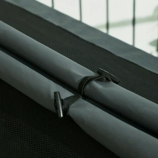 Grey oxford fabric cover with fastening straps for the elevated dog house.