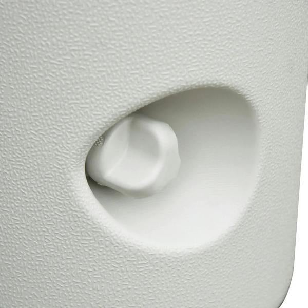 Close-up of white tent leg weight water-injection hole with cap plug