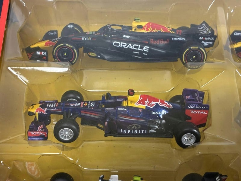 Red Bull Formula 1 Set of 7 Cars with Display Stand 1:43 Scale Bburago 38168