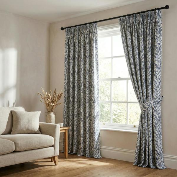 Sadie made-to-measure curtains in Cornflower, styled in a living room