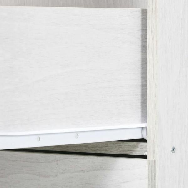 White cabinet drawer track and side panel detail with metal sliding rail