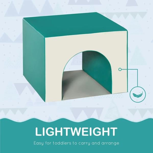 Teal and white foam play tunnel block with arched opening and curved interior