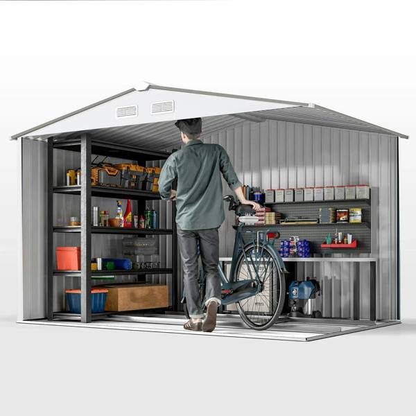 Silver metal bike shed interior with shelves and a parked mobility scooter