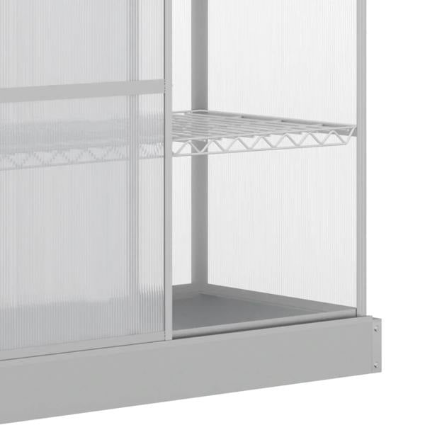 Silver aluminum greenhouse cold frame with transparent polycarbonate panels and open sliding door