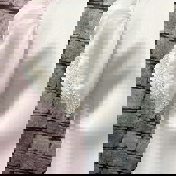 Matching detailing along cuff