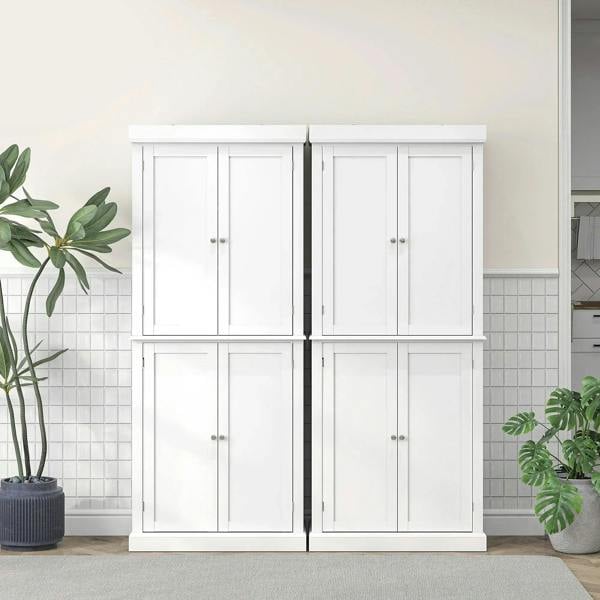 White freestanding kitchen storage cabinet with four doors and flat panel fronts
