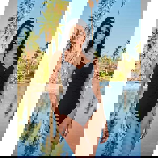 Black Miraclesuit Sanibel swimsuit with sweetheart neckline