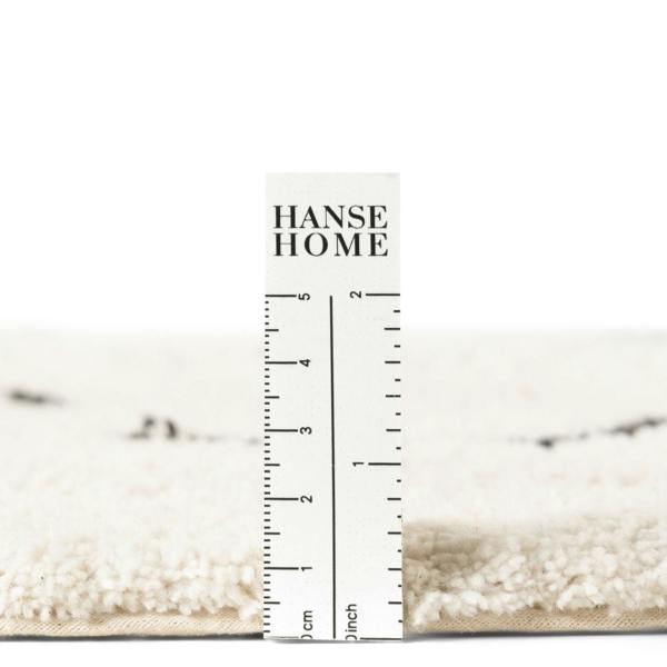 Hanse Home rug with a ruler for scale on a white background