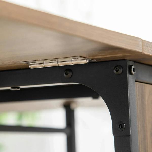 Drop-leaf hinge and metal support bracket under brown dining table top