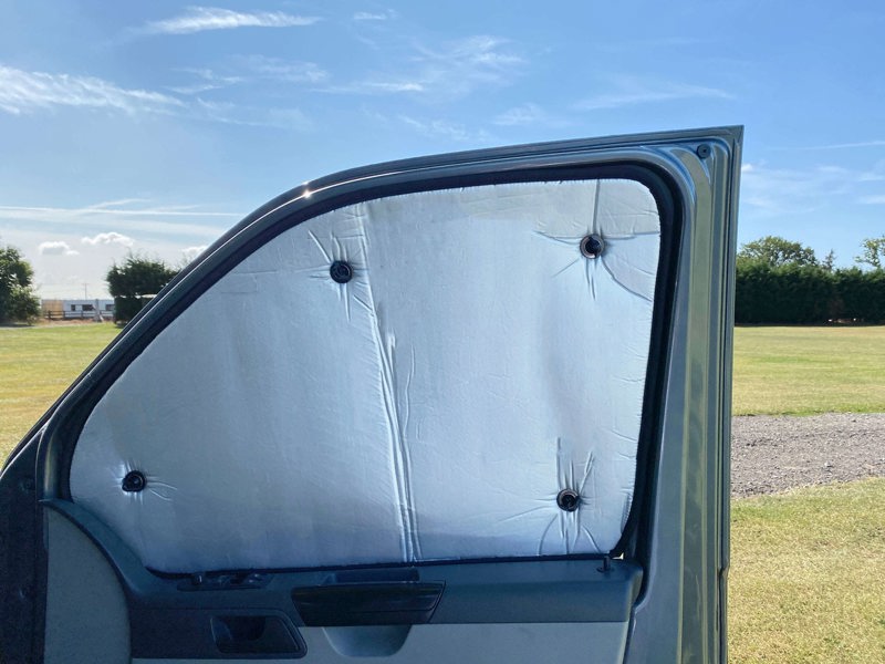 Internal Blackout Insulated Blind pictured on the right hand side window, Set for VW T5/T6 Campervans OLPRO