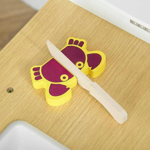 White play kitchen wooden utensil set with fish-shaped spatulas