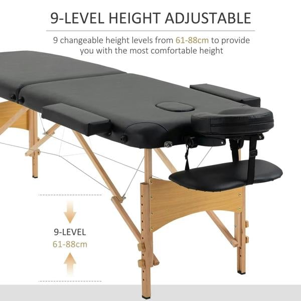 Black folding massage table with padded headrest and armrest, adjustable-height legs
