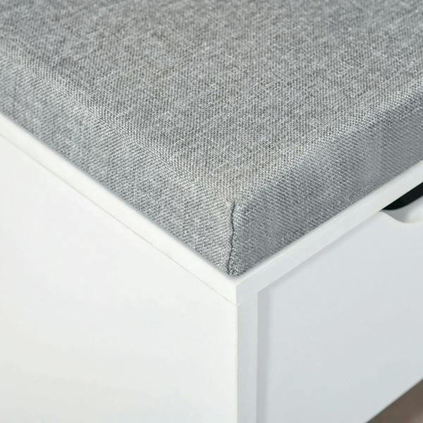 Grey fabric cushion corner on white shoe storage bench